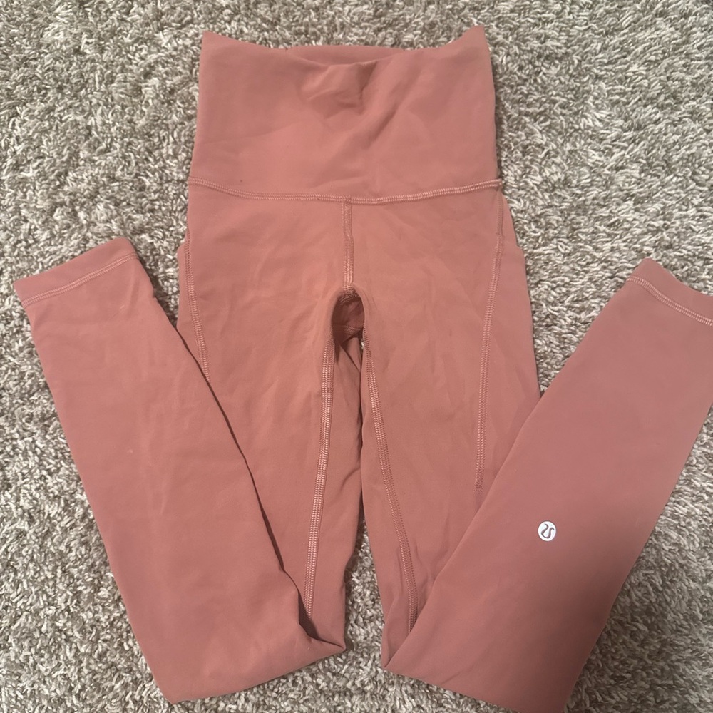 Lululemon Athletica High-Waisted Leggings in Rust